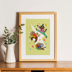 Framed illustration of cartoon cat characters on a wooden shelf with a plant.