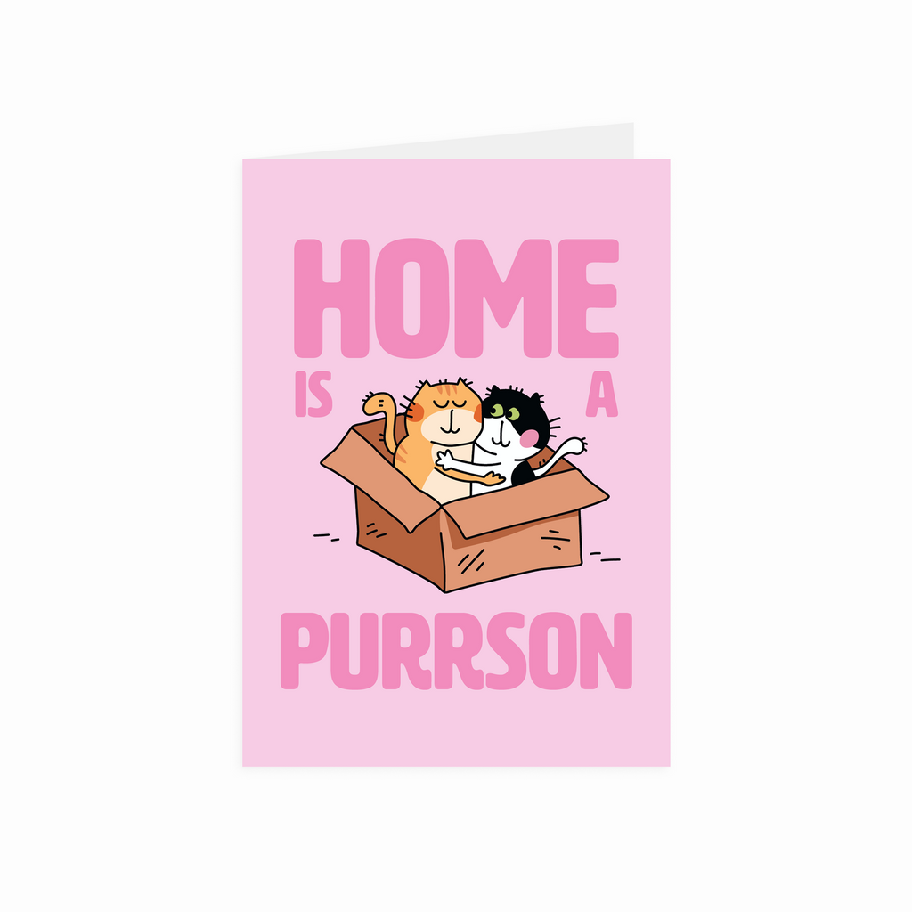 Greeting card with cats in a box and 'Home is a purrson' text on a pink background