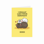 Greeting card with cute cats and text on a yellow background
