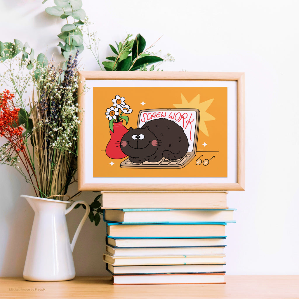 Framed illustration of a black cat on a laptop with flowers, placed on books with plants in the background.