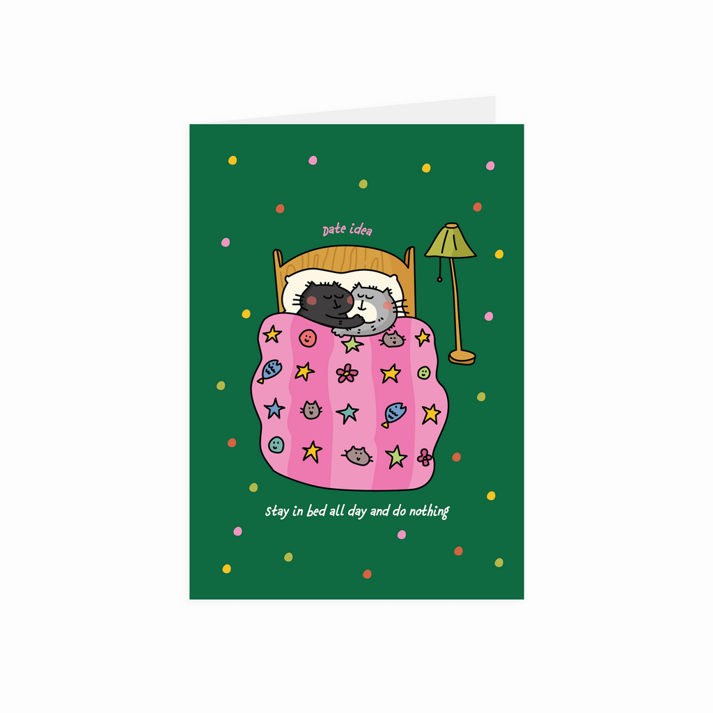 Greeting card with an illustration of cats in bed on a green background