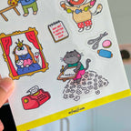 Sheet of fun cat stickers featuring various characters and objects.