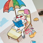 Cartoon cat reading a book under an umbrella on a beach chair.