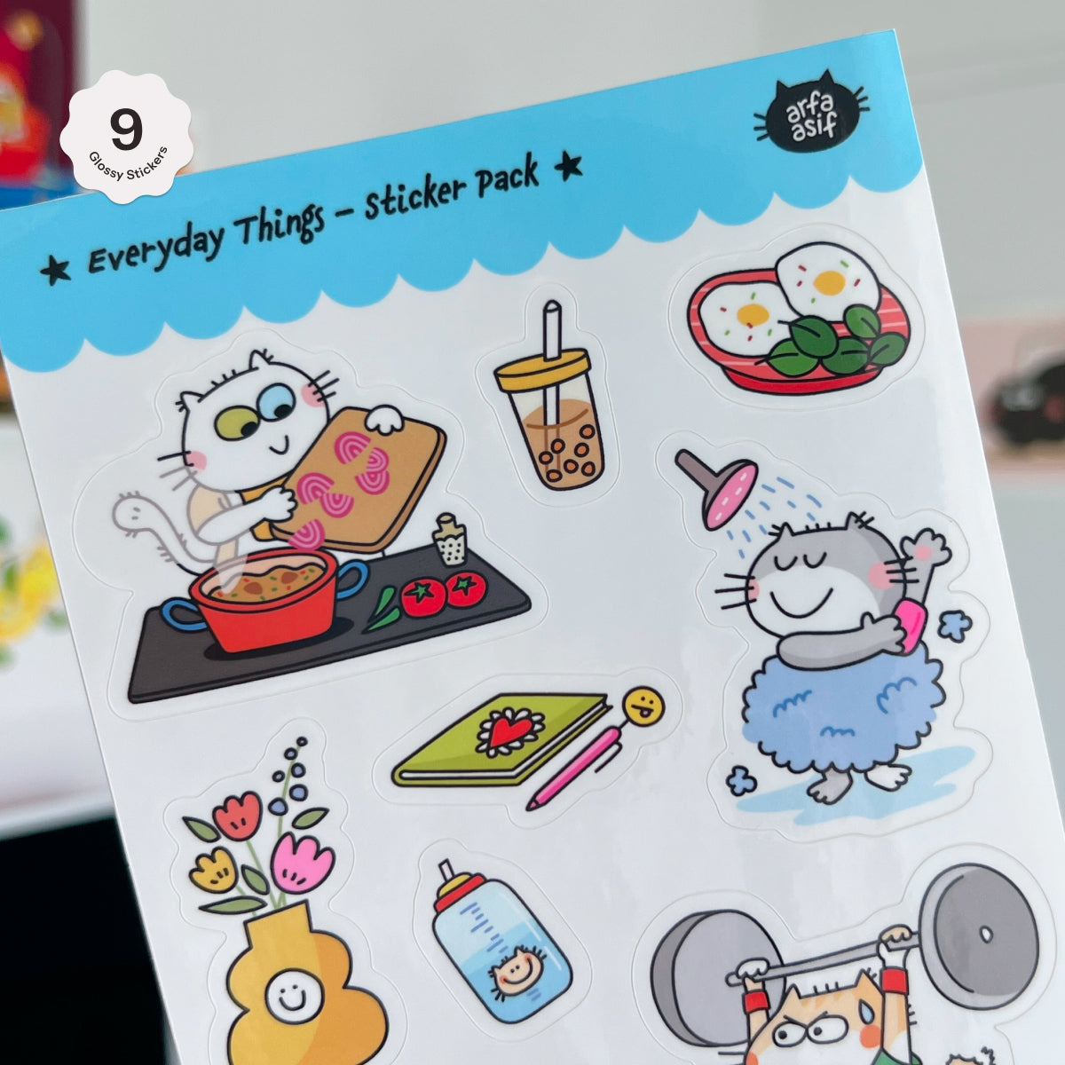 Sticker pack with various illustrations including a cat, food, and everyday objects on a white background.