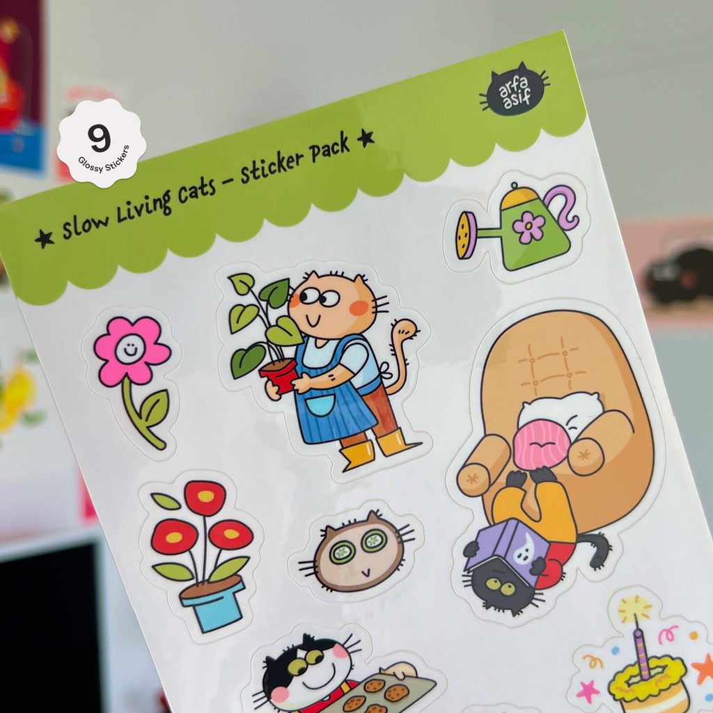 Sticker pack with cat illustrations on a green and white card.
